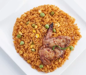 Jollof Rice + 1 pc of chicken + Ribena