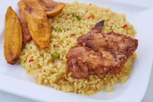 Coconut Rice + 1/4 Grilled/ Peppered Chicken + Plantain + PET