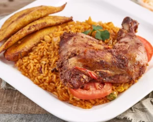 Jollof Rice + 1/4 Grilled/ Peppered Chicken + Plantain + PET